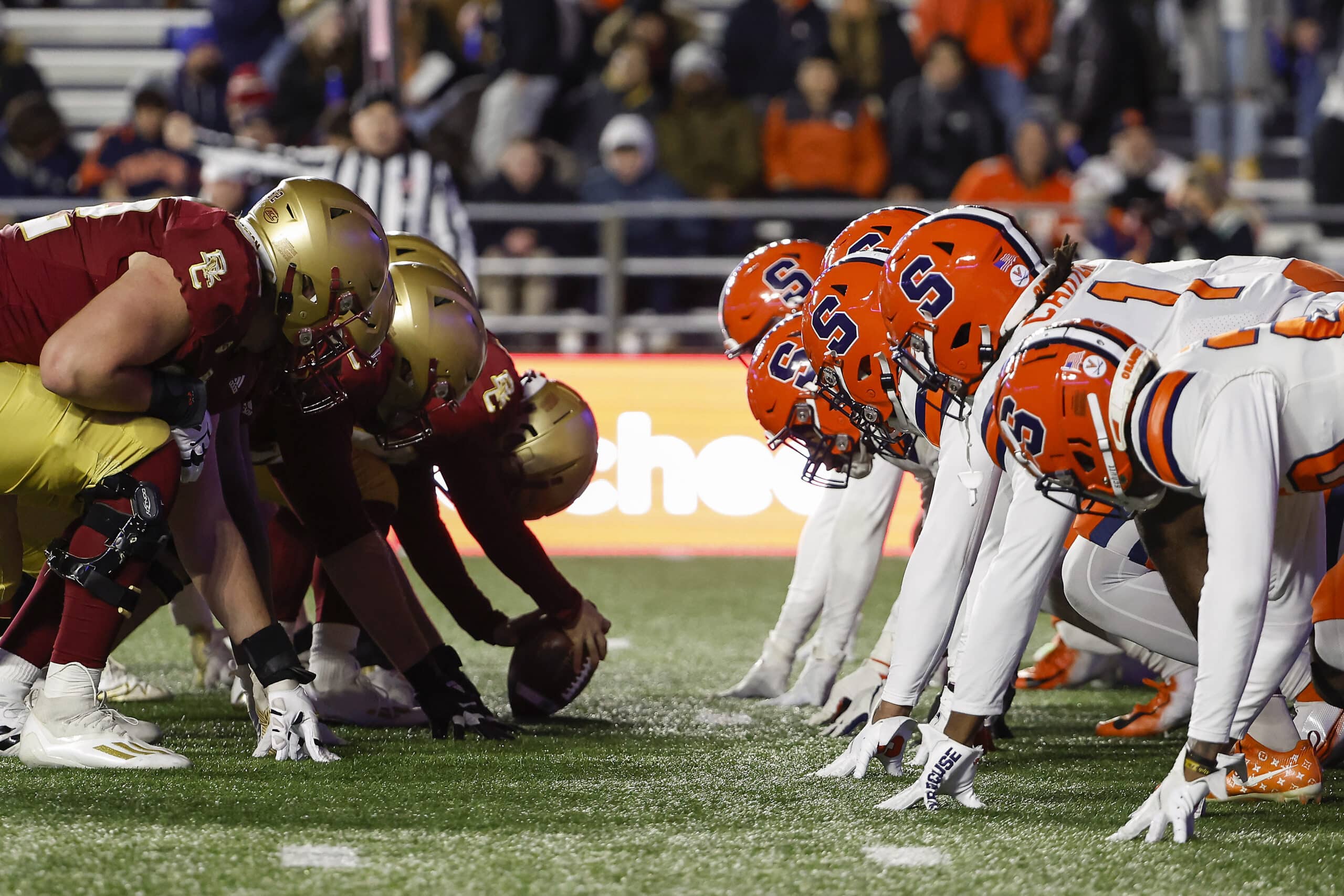 Nov 26, 2022; Chestnut Hill, Massachusetts, USA; ACC opponents the Syracuse Orange and the Boston College Eagles line up for the snap at the line of scrimmage during the first quarter at Alumni Stadium.