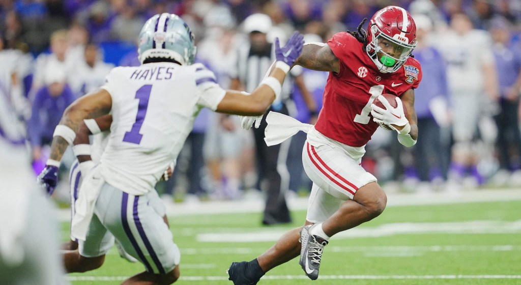 Dec 31, 2022; New Orleans, LA, USA; Alabama Crimson Tide running back Jahmyr Gibbs (1) runs the ball against Kansas State Wildcats safety Josh Hayes (1) during the second half in the 2022 Sugar Bowl at Caesars Superdome.