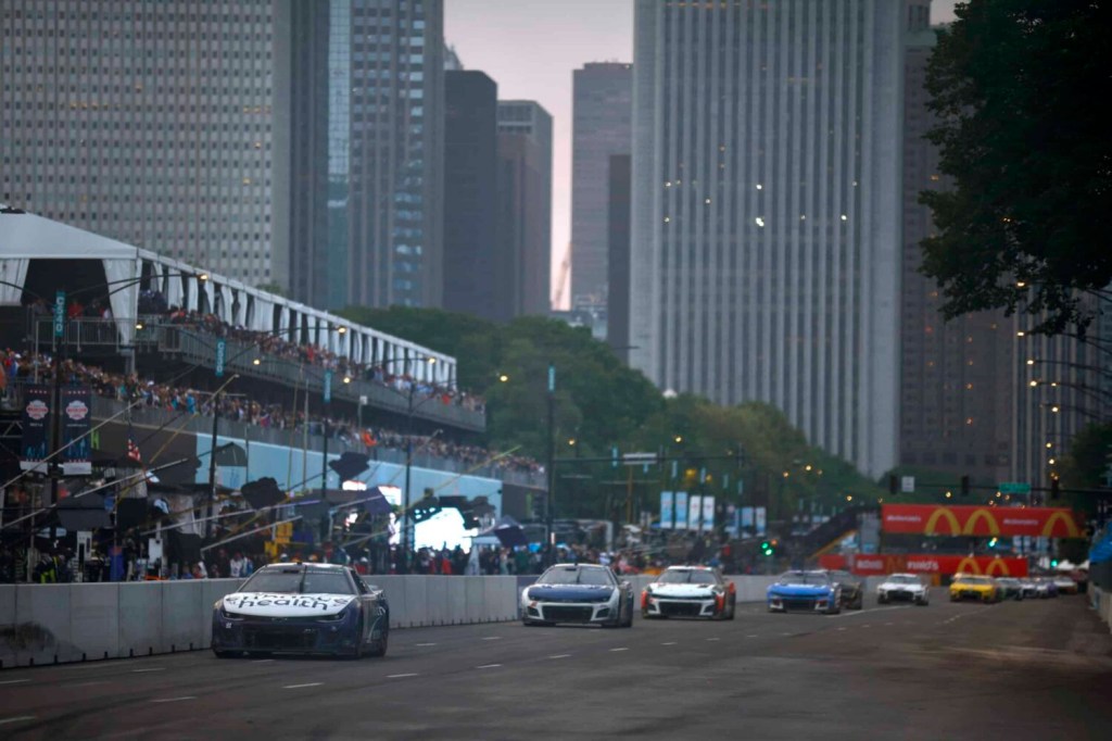 Shane Van Gisbergen, driver of the #91 Enhance Health Chevrolet, leads the field during the NASCAR Cup Series Grant Park 220 at the Chicago Street Course.