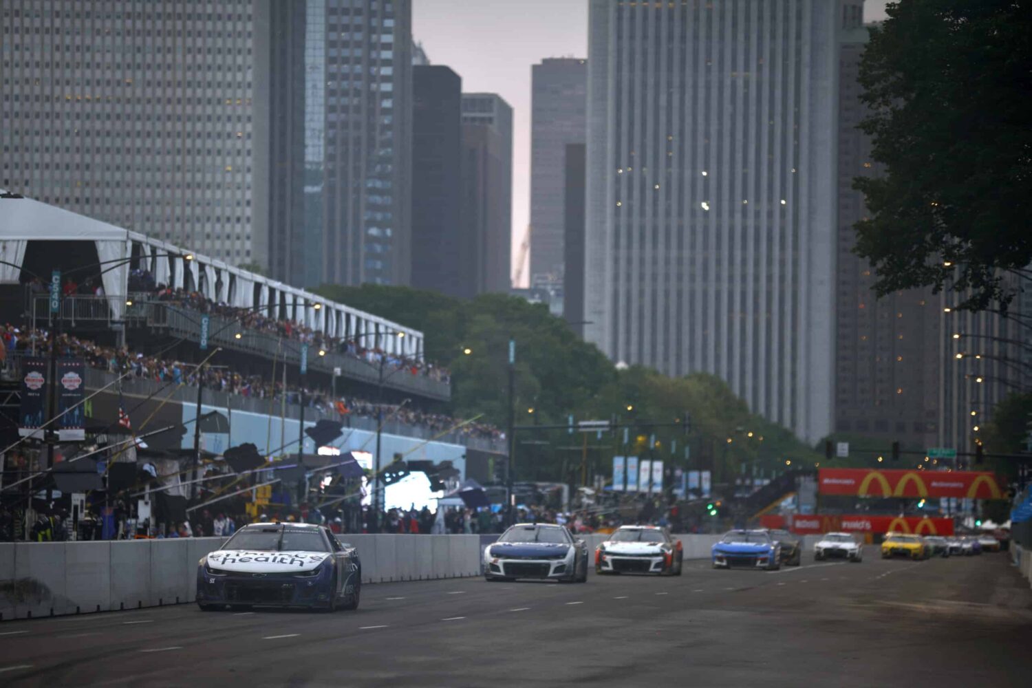 Shane Van Gisbergen, driver of the #91 Enhance Health Chevrolet, leads the field during the NASCAR Cup Series Grant Park 220 at the Chicago Street Course.