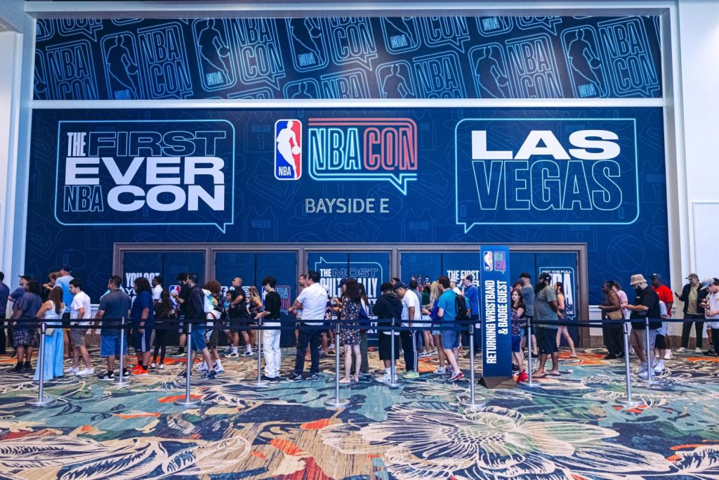 A line of fans waits to enter NBA Con 2023 in Las Vegas.