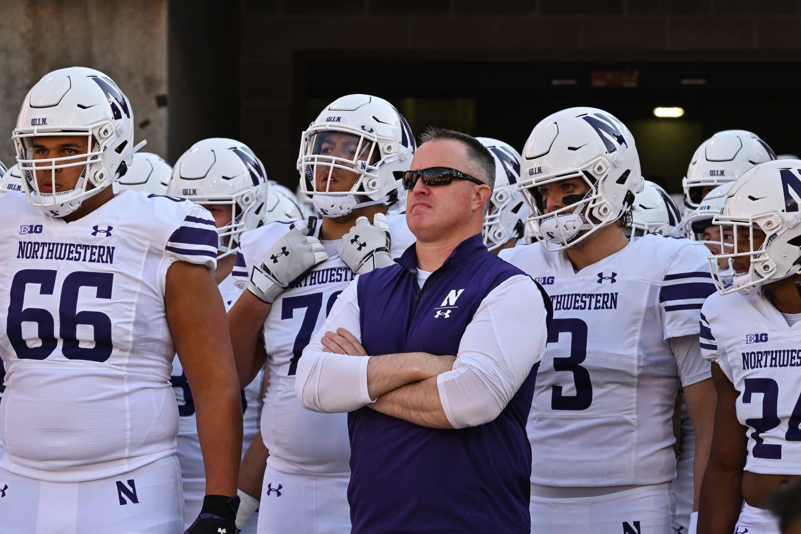 Oct 29, 2022; Iowa City, Iowa, USA; Northwestern head coach Pat Fitzgerald and the Wildcats team before the game against the Iowa Hawkeyes at Kinnick Stadium.