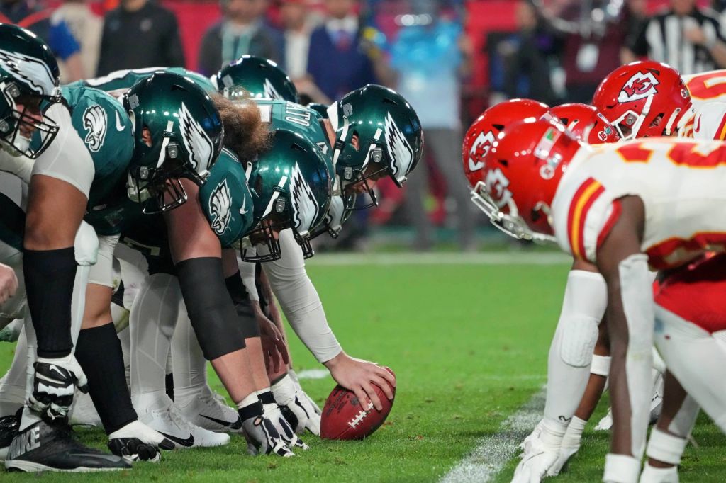 New NFLPA executive director Lloyd Howell worked at Booz Allen for 34 years.