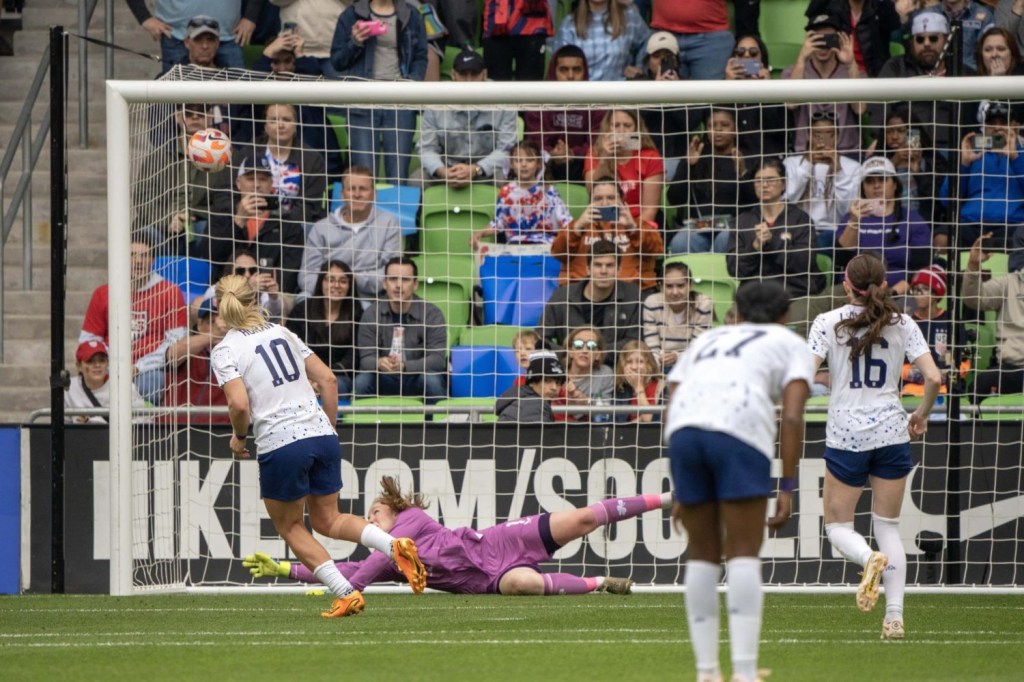 U.S. Women's National Team midfielder Lindsey Horan (10) kicks a goal against Republic of Ireland Women's National Team goalkeeper Courtney Bronsan (1) during the second half at Q2 Stadium.