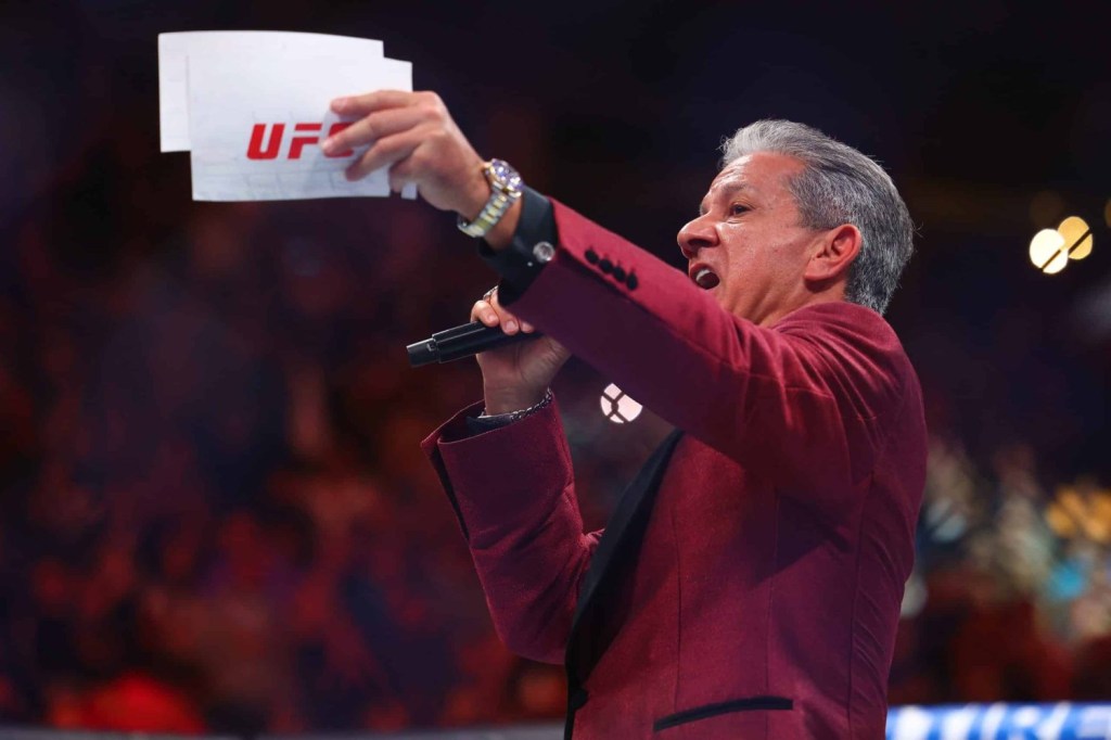Ring announcer Bruce Buffer introduces Amanda Nunes and Irene Aldana before their fight at UFC 289 at Rogers Arena.