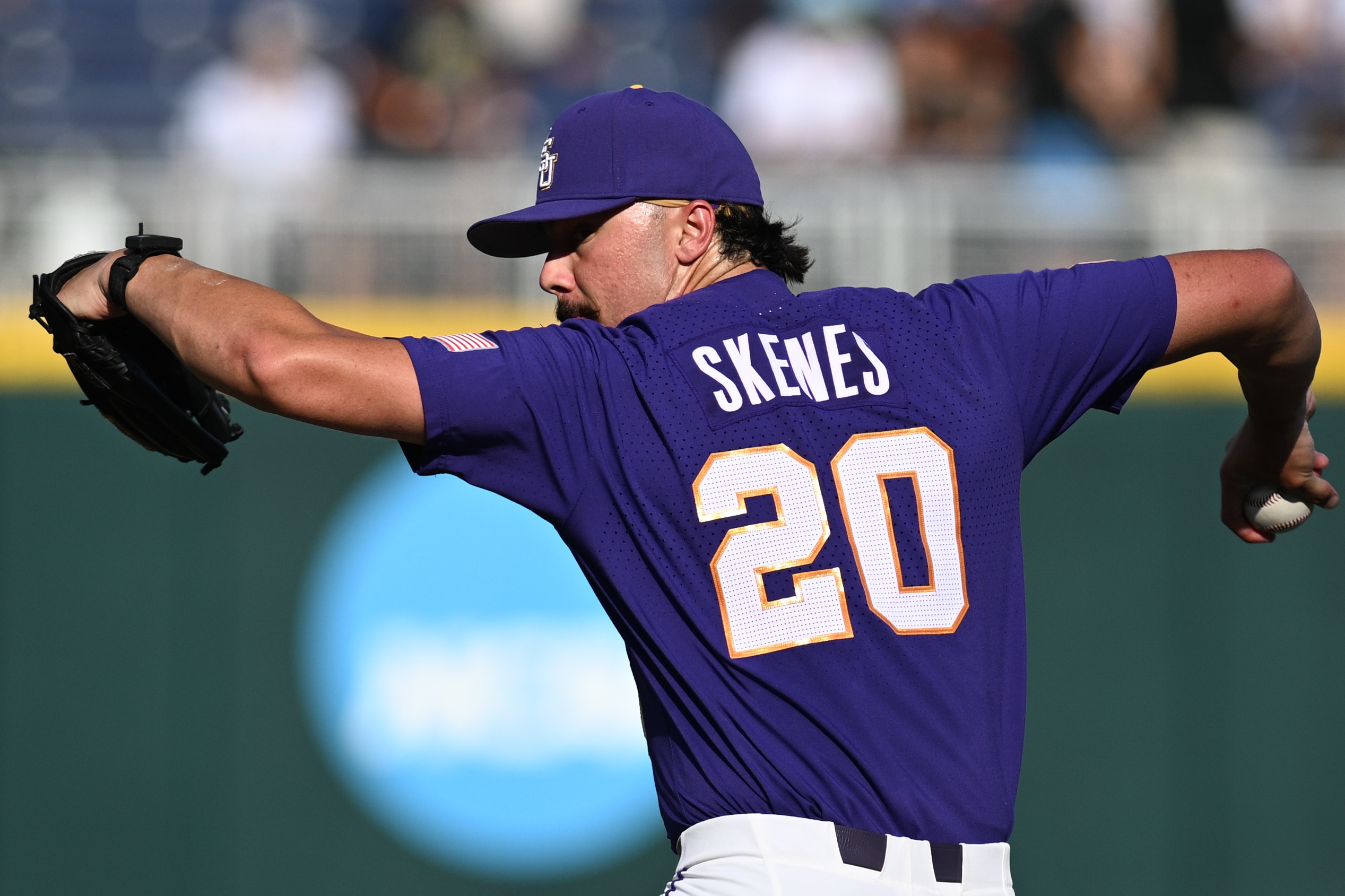 LSU Tigers starting pitcher Paul Skenes (20) throws against the Wake Forest Demon Deacons in the first inning at Charles Schwab Field Omaha.
