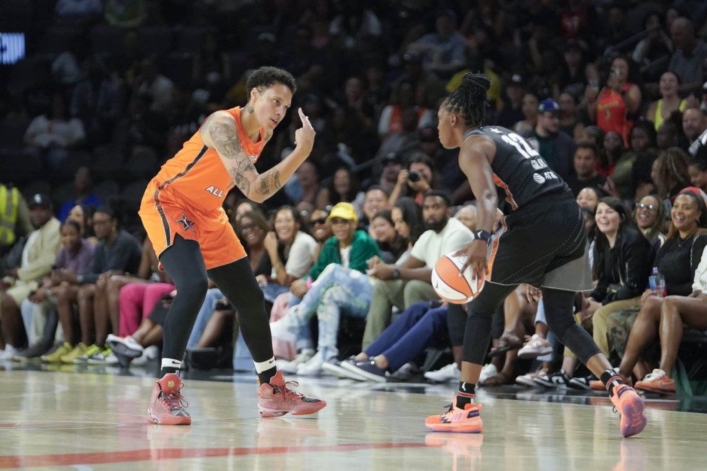 Team Wilson guard Chelsea Gray controls the ball against Team Stewart frontcourt Brittney Griner during the first half in the 2023 WNBA All-Star Game from Las Vegas.