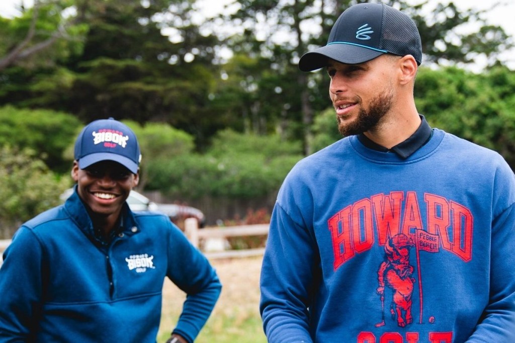 A view of Steph Curry on the golf course with a Howard University golf player.