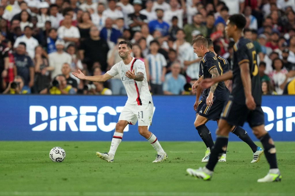 AC Milan forward Christian Pulisic reacts against Real Madrid in the first half at the Rose Bowl.
