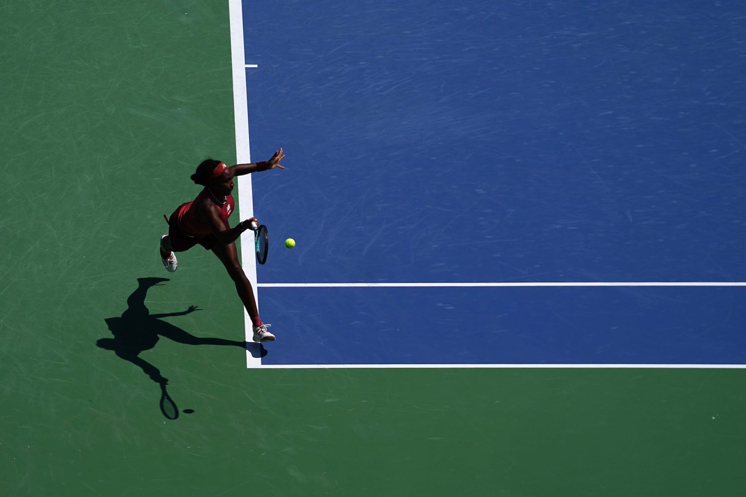 Coco Gauff returns a shot to Karolina Muchova during the women’s singles final of the Western & Southern Open tennis tournament.