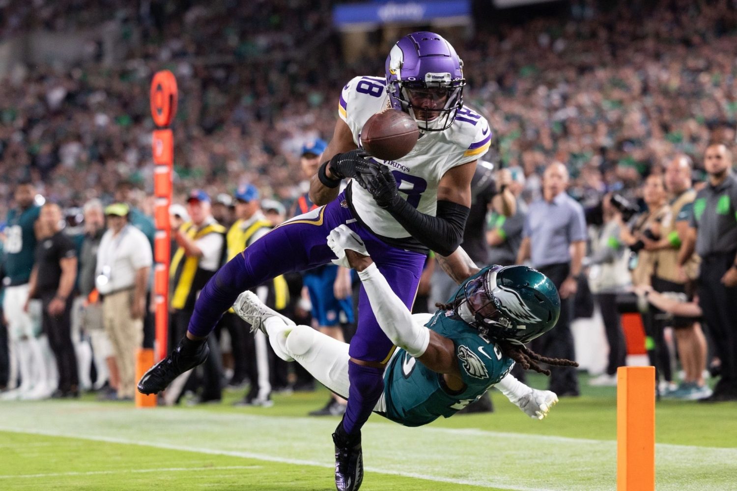 Minnesota Vikings wide receiver Justin Jefferson fumbles the ball out of bounds in the end zone while being tackled by Philadelphia Eagles safety Terrell Edmunds during the second quarter at Lincoln Financial Field.