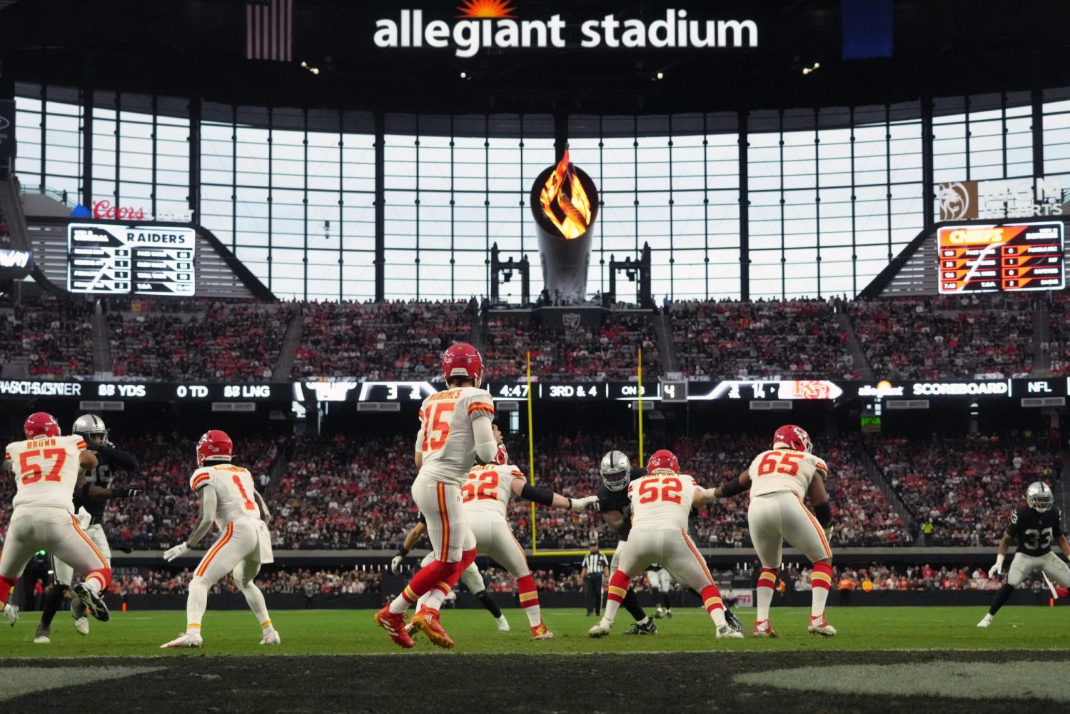 An overall view as Kansas City Chiefs quarterback Patrick Mahomes throws a pass against the Las Vegas Raiders in the first half at Allegiant Stadium.