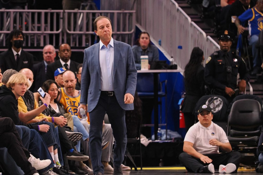 Golden State Warriors majority owner Joe Lacob walks alone the baseline during the third quarter against the Los Angeles Clippers at Chase Center.