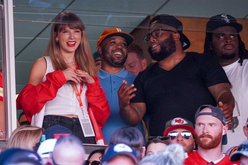 Sep 24, 2023; Kansas City, Missouri, USA; Taylor Swift laughs while watching the Kansas City Chiefs vs Chicago Bears game during the first half at GEHA Field at Arrowhead Stadium.