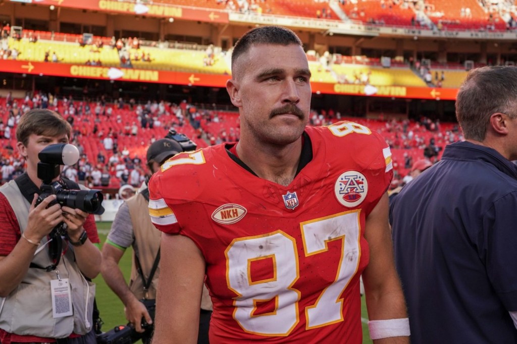 Kansas City Chiefs tight end Travis Kelce on field after the game at GEHA Field at Arrowhead Stadium.