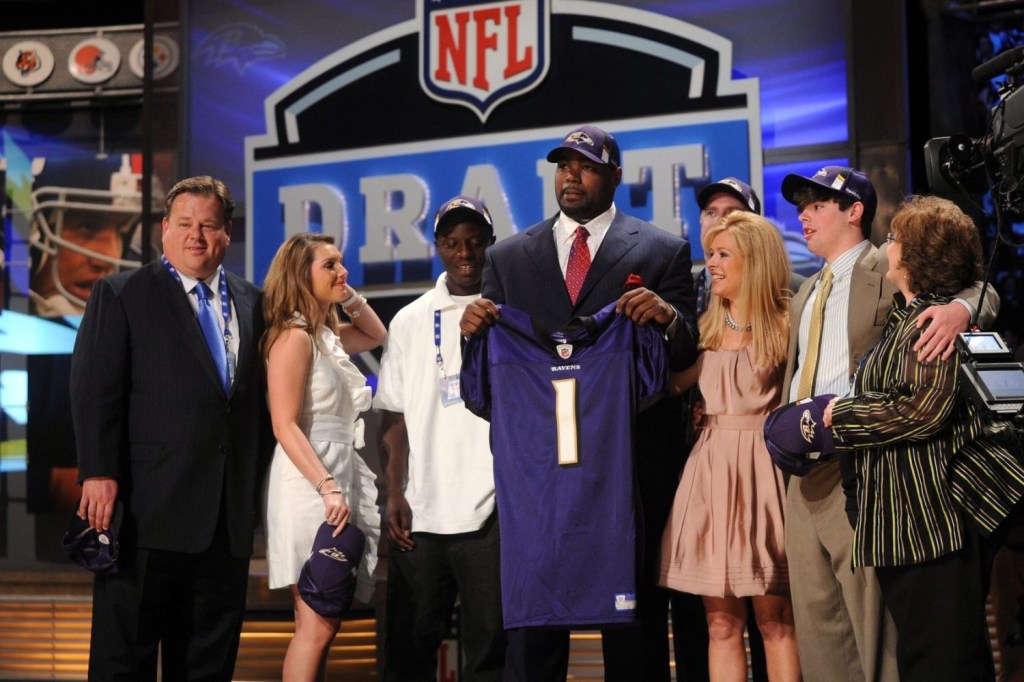 Mississippi tackle Michael Oher poses with his family after being selected as the number 23 overall pick to the Baltimore Ravens in the 2009 NFL Draft at Radio City Music Hall in New York City.