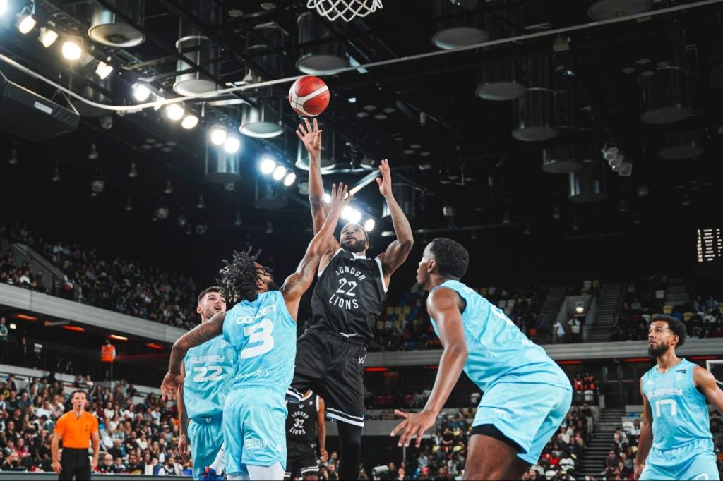 A player from the London Lions drives to the hoop in a British Basketball League game against the Surrey Scorchers.