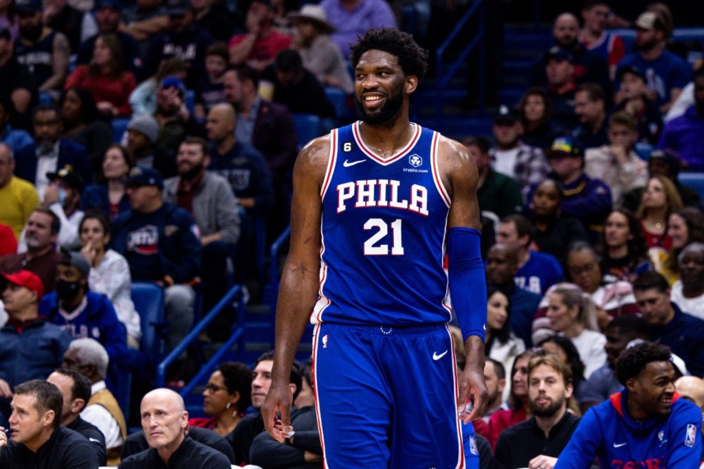 Philadelphia 76ers center Joel Embiid smiles during a time out against the New Orleans Pelicans in the first half at Smoothie King Center.