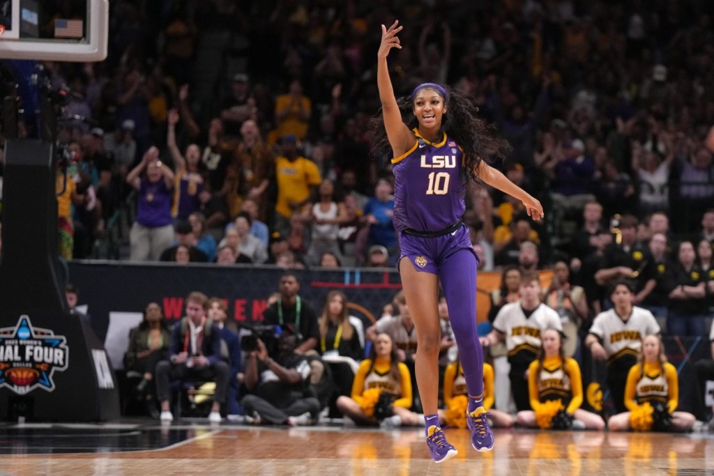 LSU Lady Tigers forward Angel Reese (10) celebrates during the NCAA Womens Basketball Final Four National Championship against the Iowa Hawkeyes at American Airlines Center.