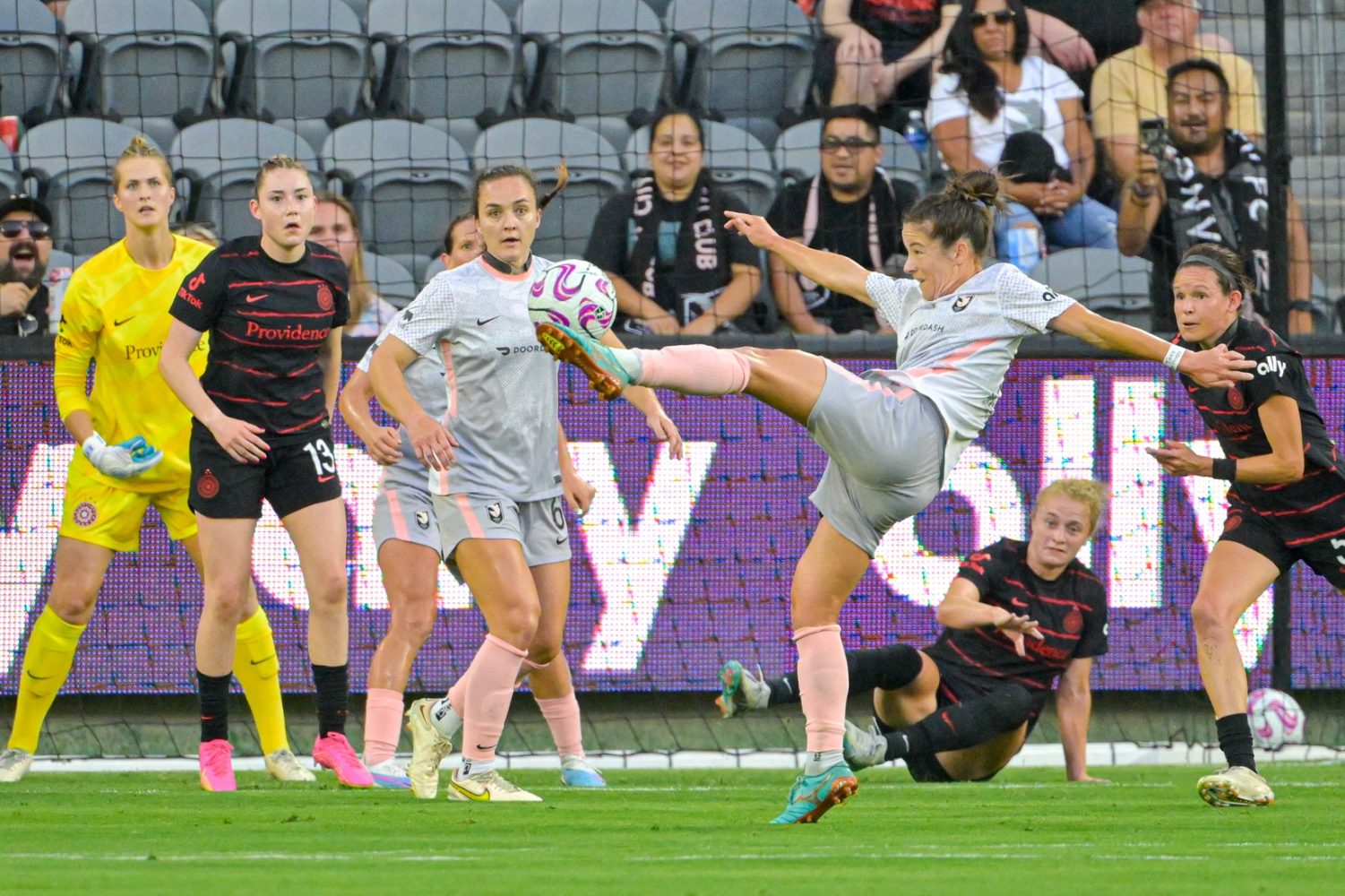 Angel City FC defender Paige Nielsen plays the ball against the Portland Thorns FC in the first half at BMO Stadium.