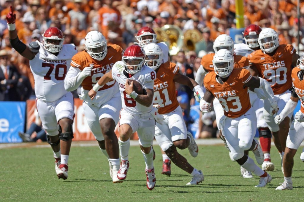 Oklahoma Sooners quarterback Dillon Gabriel carries the ball during the Red River Rivalry college football game between the University of Oklahoma Sooners and the University of Texas Longhorns at the Cotton Bowl in Dallas on Saturday, Oct. 7, 2023.