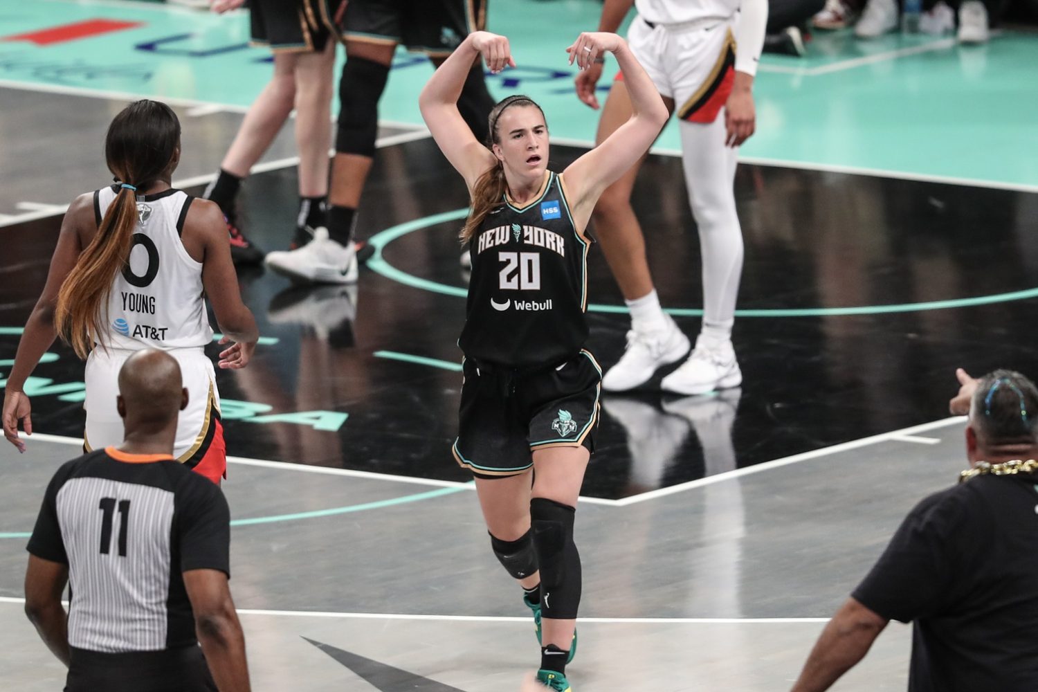 New York Liberty guard Sabrina Ionescu (20) waves to the crowd against the Las Vegas Aces during game three of the 2023 WNBA Finals at Barclays Center.