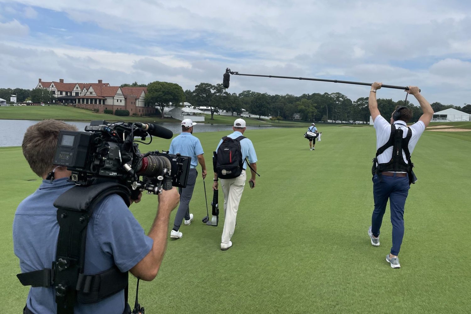 A view of Netflix camera crews filming a golfer for its series "Full Swing."