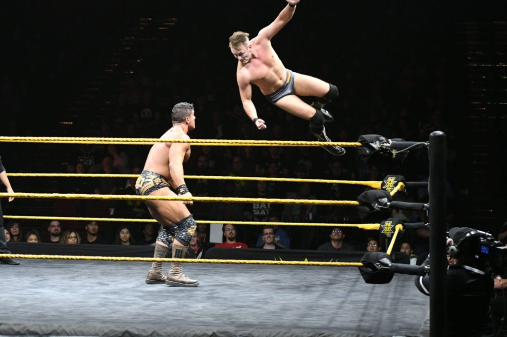 WWE NXT wrestlers perform during a show.