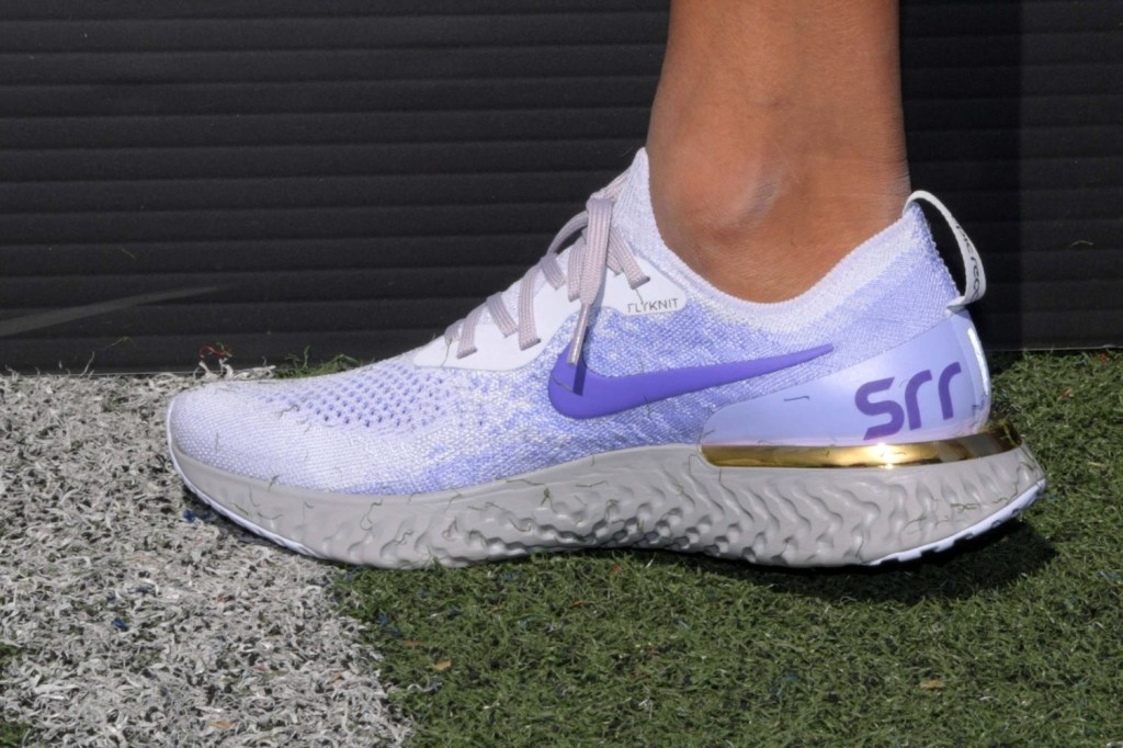 Detailed view of the SRR initials on the Nike Epic React flyknit shoes of Sanya Richards-Ross during the 125th Penn Relays at Franklin Field.