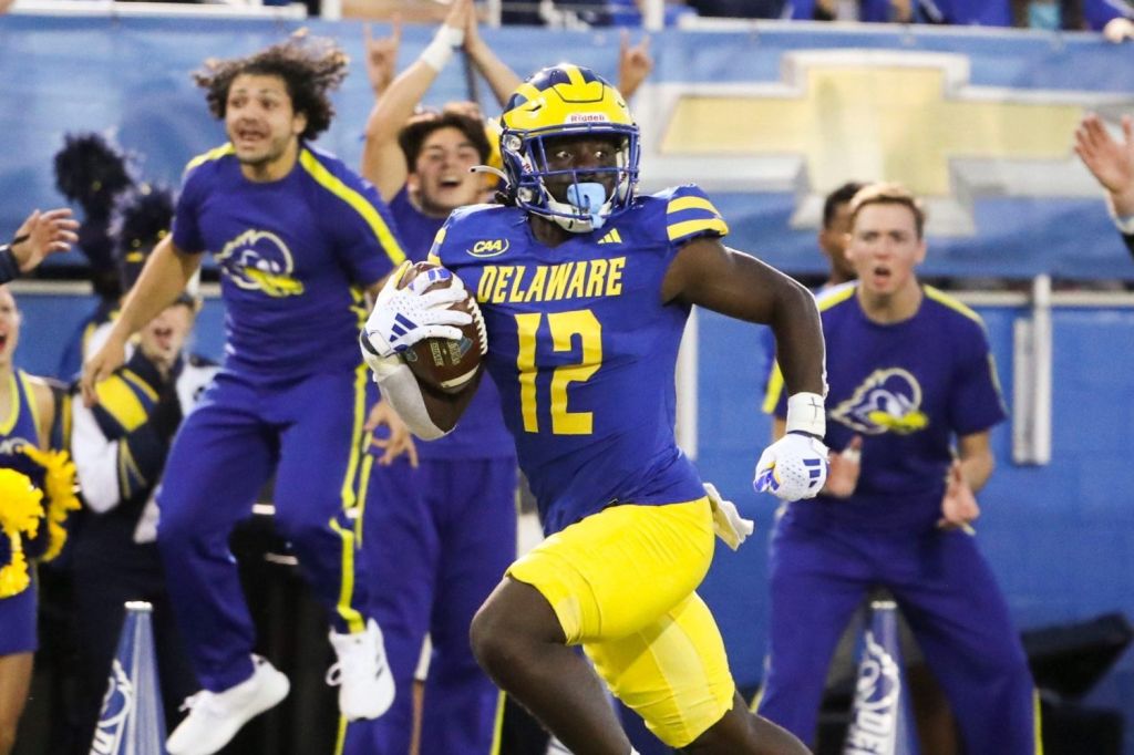 Delaware receiver Kym Wimberly leaves St. Francis defenders behind as he turns a reception into a touchdown in the final minute of the first half at Delaware Stadium, Saturday Sept. 16, 2023.