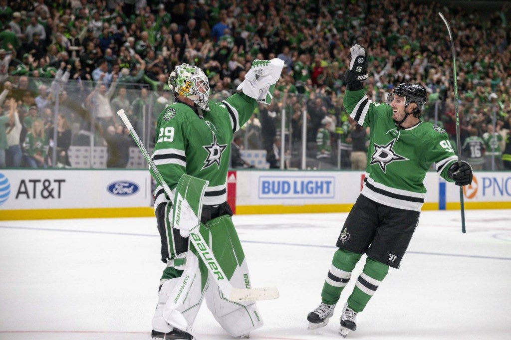 Dallas Stars goaltender Jake Oettinger and center Matt Duchene celebrate after the Stars defeat the St. Louis Blues in the overtime shootout period at the American Airlines Center.