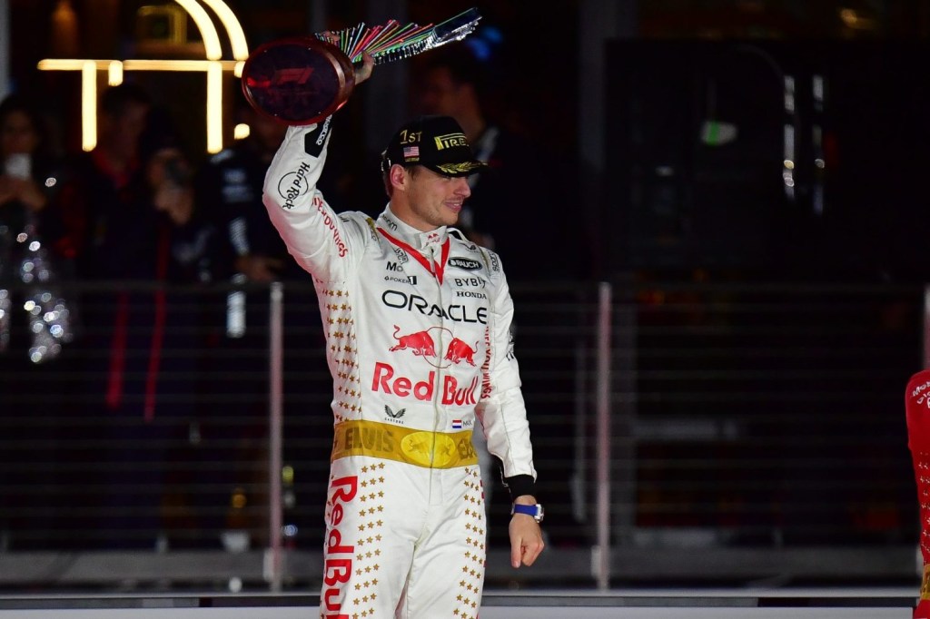 Red Bull Racing driver Max Verstappen of The Netherlands celebrates his victory of the Las Vegas Grand Prix at Las Vegas Strip Circuit.