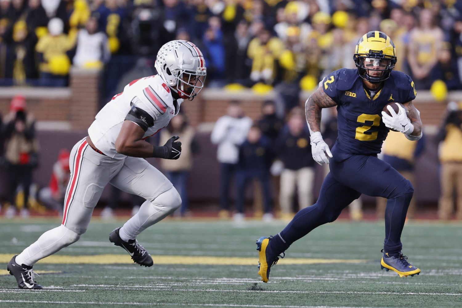 Michigan Wolverines running back Blake Corum rushes in the second half against the Ohio State Buckeyes at Michigan Stadium.