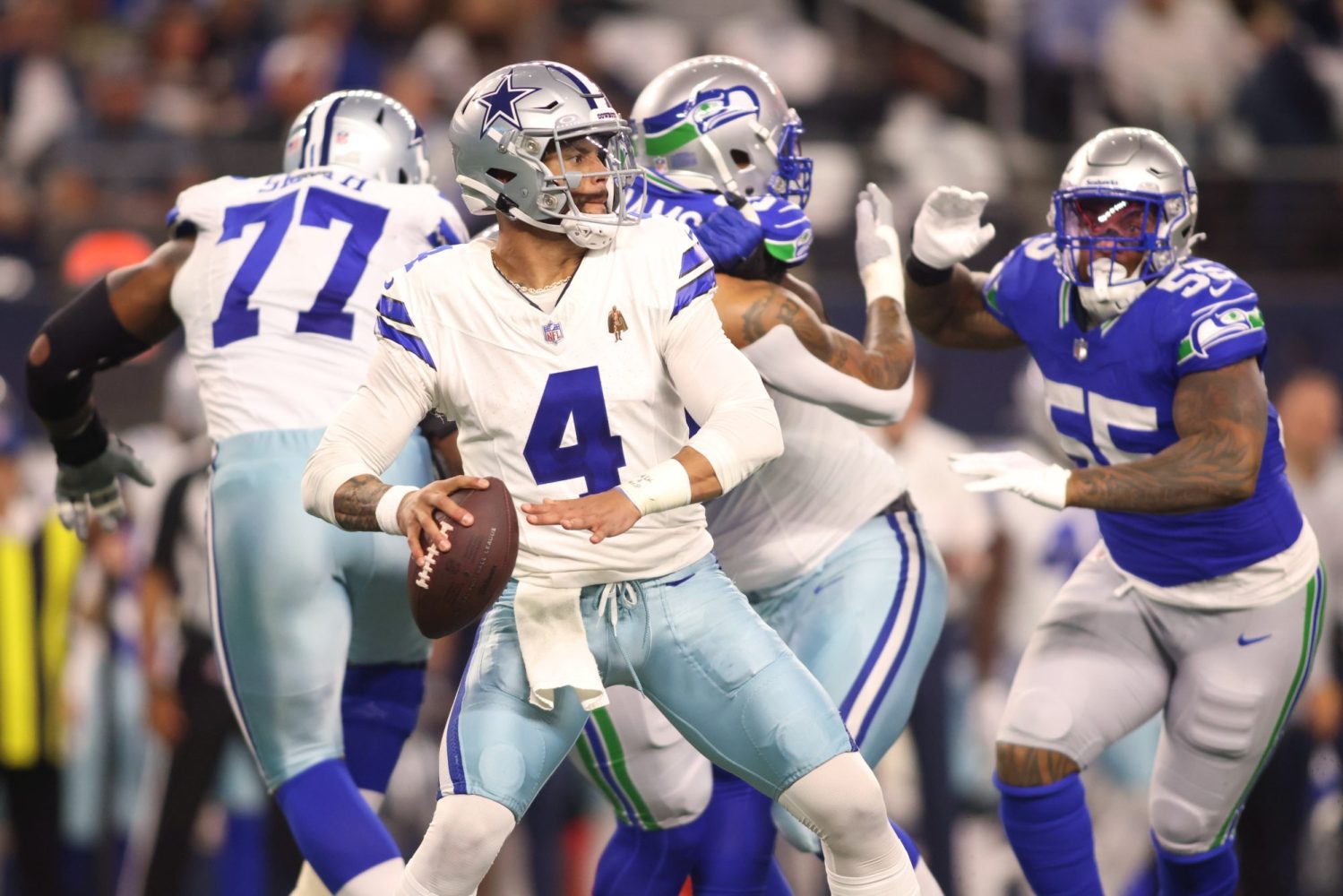 Dallas Cowboys quarterback Dak Prescott throws a pass during the first half against the Seattle Seahawks at AT&T Stadium.