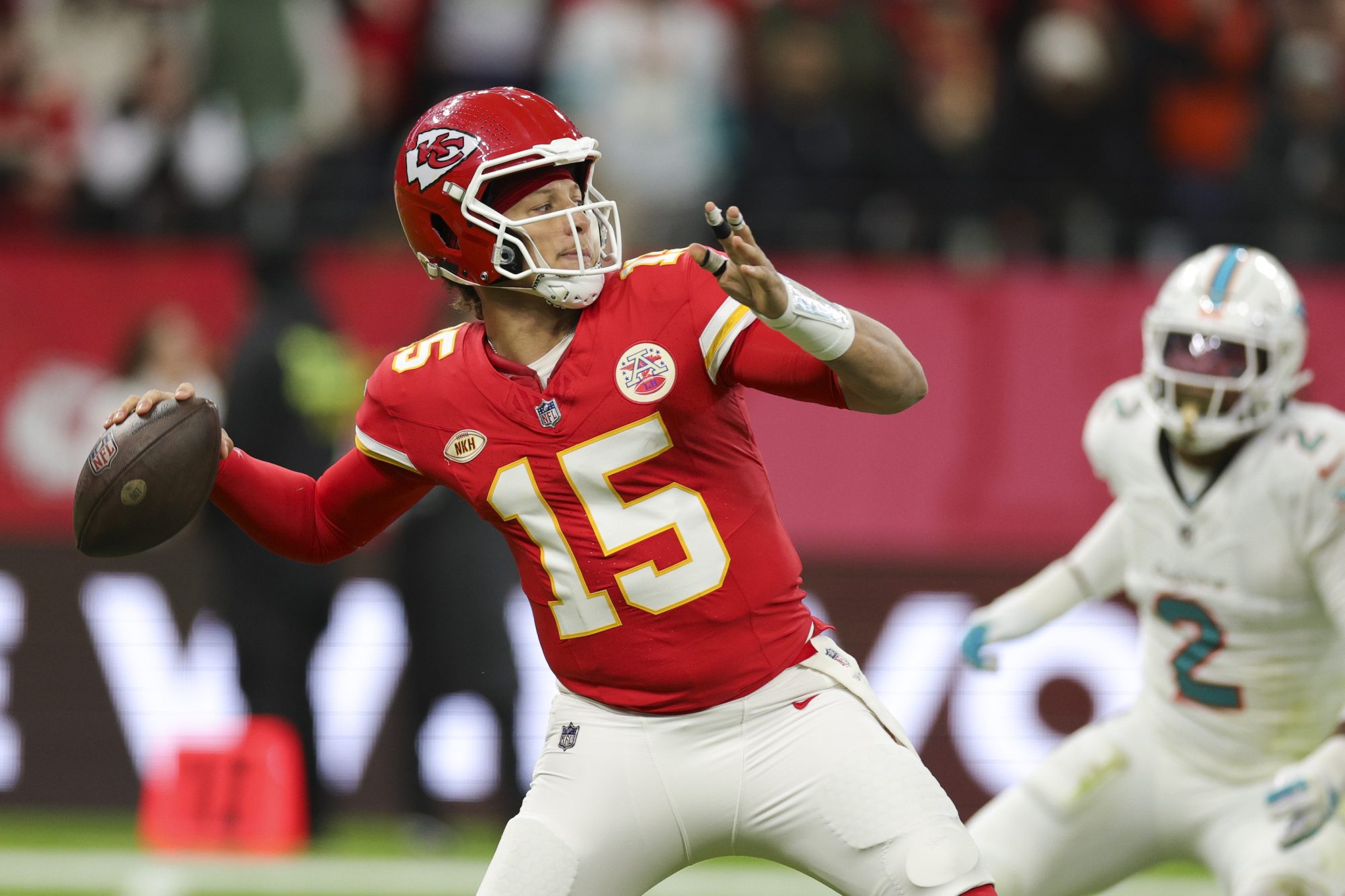 Nov 5, 2023; Frankfurt, Germany, ; Kansas City Chiefs quarterback Patrick Mahomes (15) throws a pass against the Miami Dolphins in the first quarter during an NFL International Series game at Deutsche Bank Park.