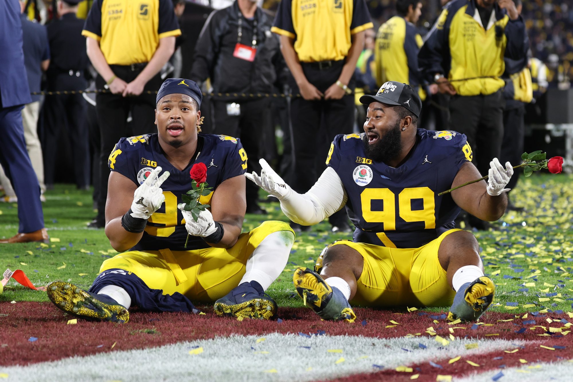 Jan 1, 2024; Pasadena, CA, USA; Michigan Wolverines defensive lineman Kris Jenkins (94) and defensive lineman Cam Goode (99) celebrate on the field after defeating the Alabama Crimson Tide in the 2024 Rose Bowl college football playoff semifinal game at Rose Bowl.