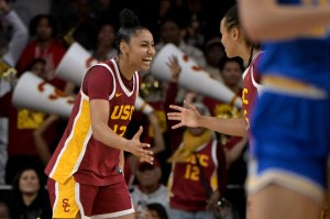 Jan 14, 2024; Los Angeles, California, USA; USC Trojans guard JuJu Watkins (12) celebrates in the fourth quarter after defeating the UCLA Bruins at Galen Center.