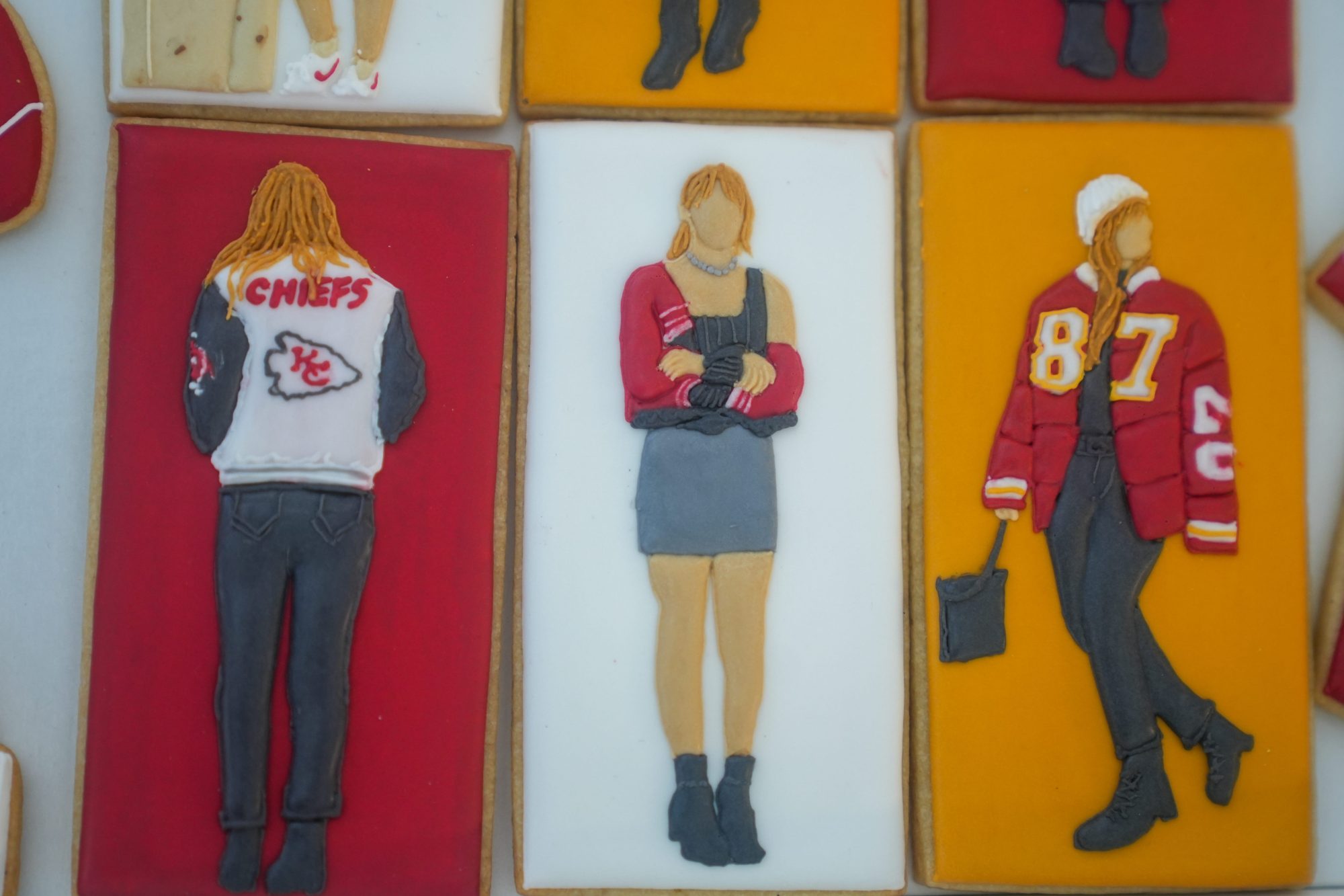 Emily Henegar, a baker and content creator, made a batch of NFL-inspired cookies featuring Taylor Swift and Travis Kelce.