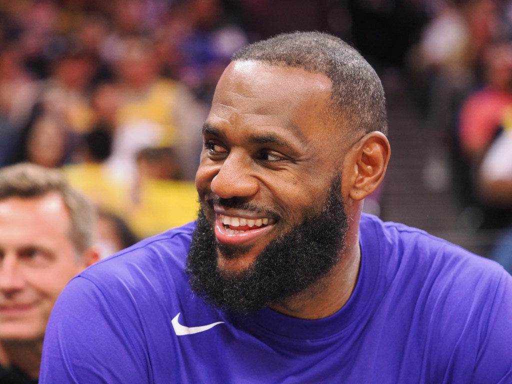 Oct 14, 2022; Sacramento, California, USA; Los Angeles Lakers small forward LeBron James (6) smiles towards fans from the bench during the fourth quarter against the Sacramento Kings at Golden 1 Center.