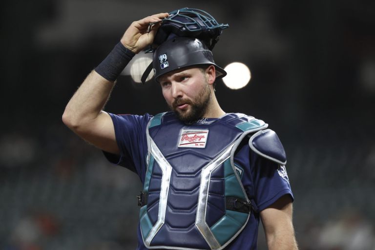 May 11, 2026; Houston, Texas, USA; Seattle Mariners catcher Cal Raleigh (29) puts on his mask after a play during the second inning against the Houston Astros at Daikin Park.