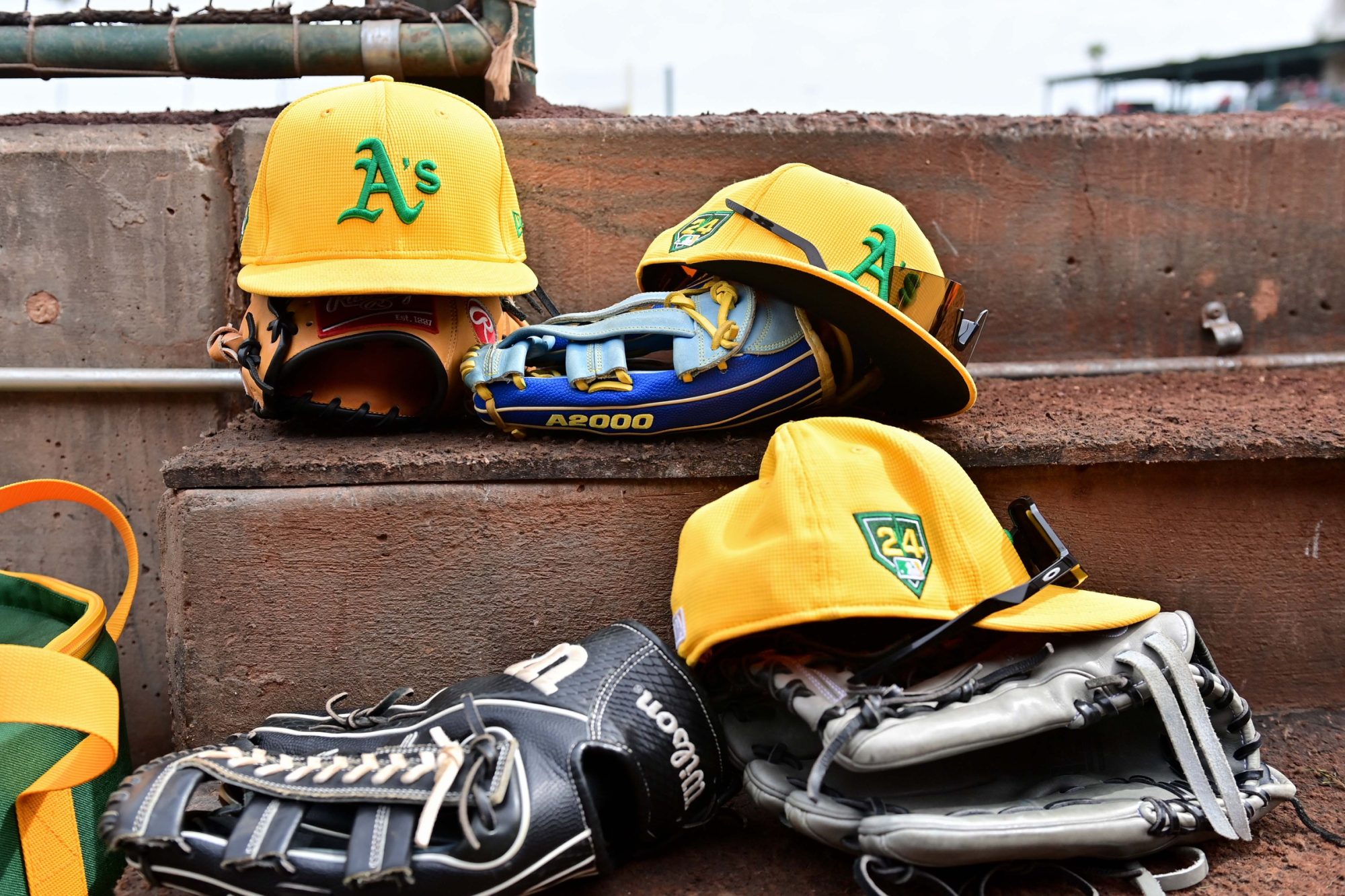 Oakland A's hats and gloves