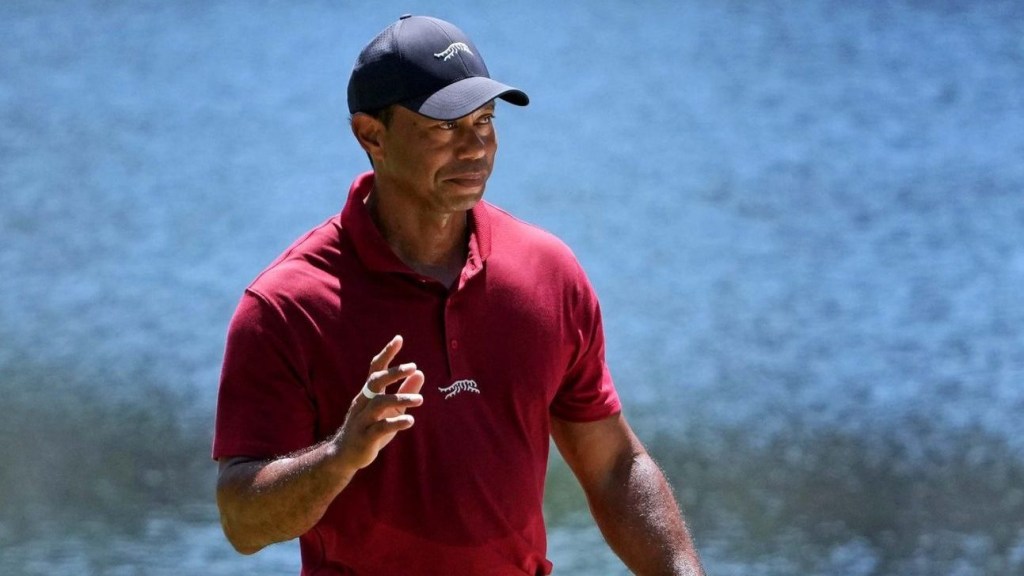 Apr 14, 2024; Augusta, Georgia, USA; Tiger Woods reacts to his putt on the 16th green during the final round of the Masters Tournament.