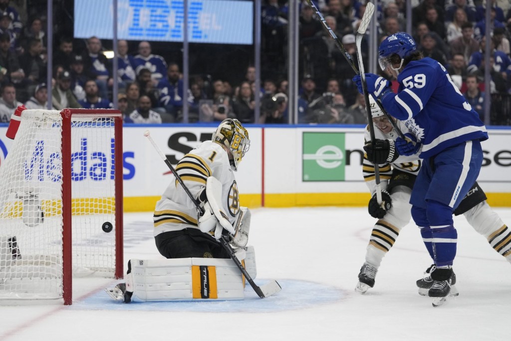 Toronto Maple Leafs forward Tyler Bertuzzi (59) scores against Boston Bruins goaltender Jeremy Swayman (1) during the third period of game three of the first round of the 2024 Stanley Cup Playoffs at Scotiabank Arena.