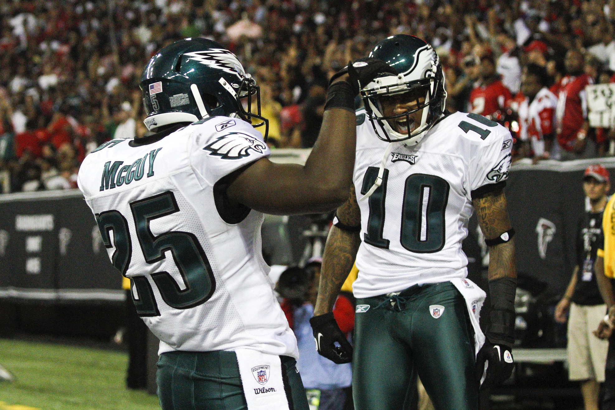 Philadelphia Eagles running back LeSean McCoy (25) celebrates with wide receiver DeSean Jackson (10) after scoring a touchdown against the Atlanta Falcons in the third quarter at the Georgia Dome. The Falcons beat the Eagles 35-31.