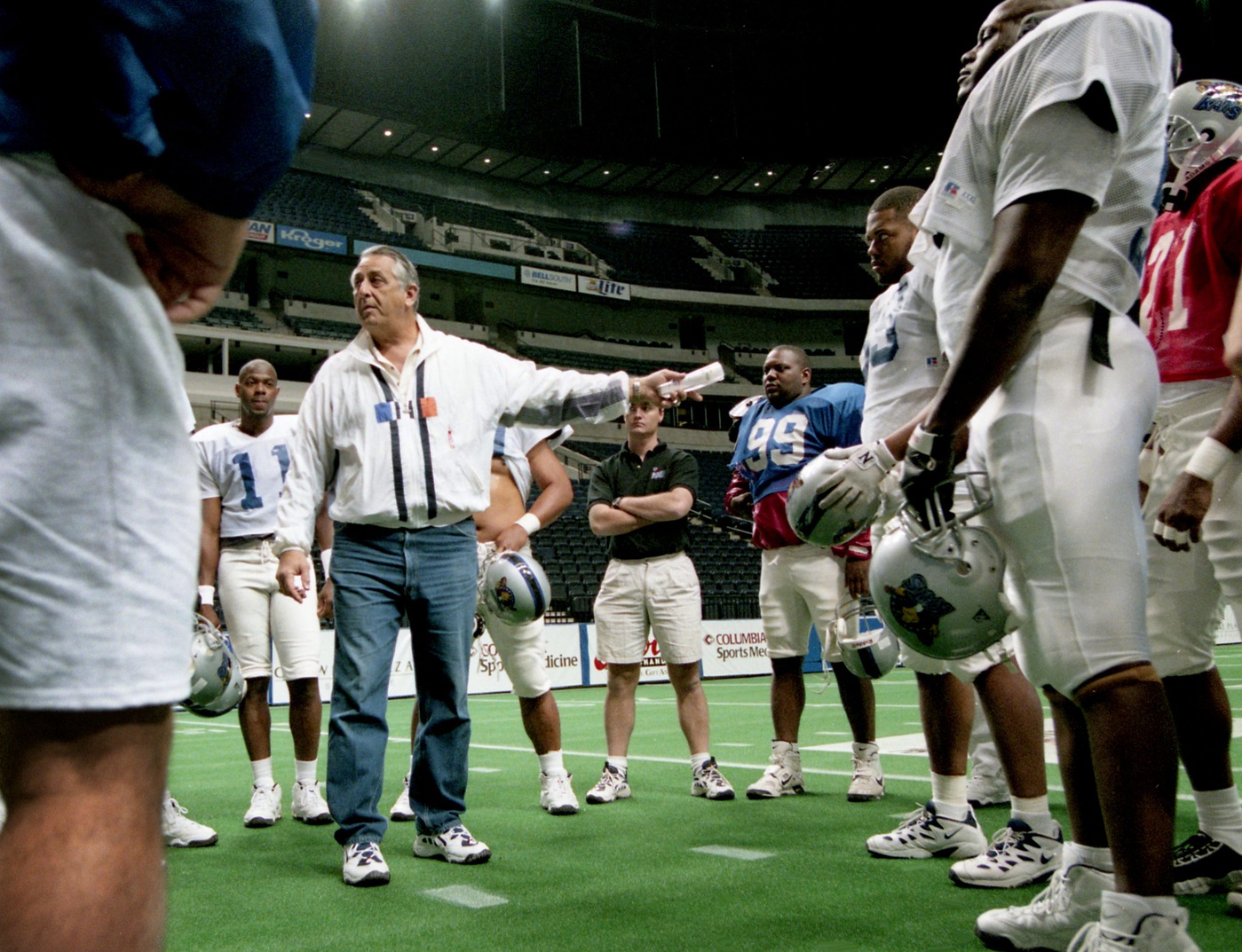 Nashville Kats head coach Eddie Khayat talks with his players at the Nashville Arena as they prepare April 17, 1997, for their exhibition opener the next night at the site. The Kats will be making their debut in the Arena Football League.