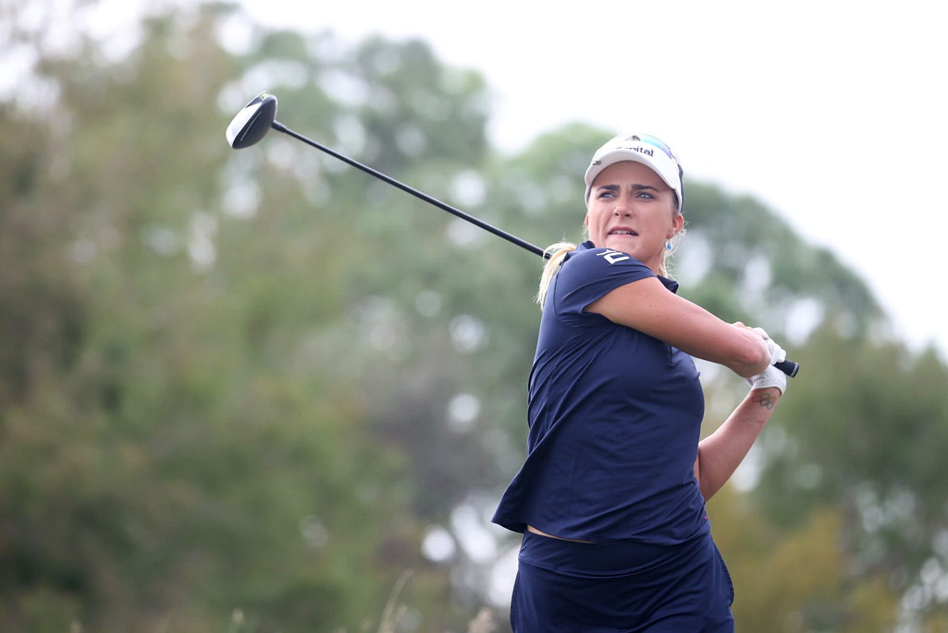 Lexi Thompson tees off on the second hole at the Grant Thornton Invitational at Tiburon Golf Club in Naples on Friday, Dec. 8, 2023.