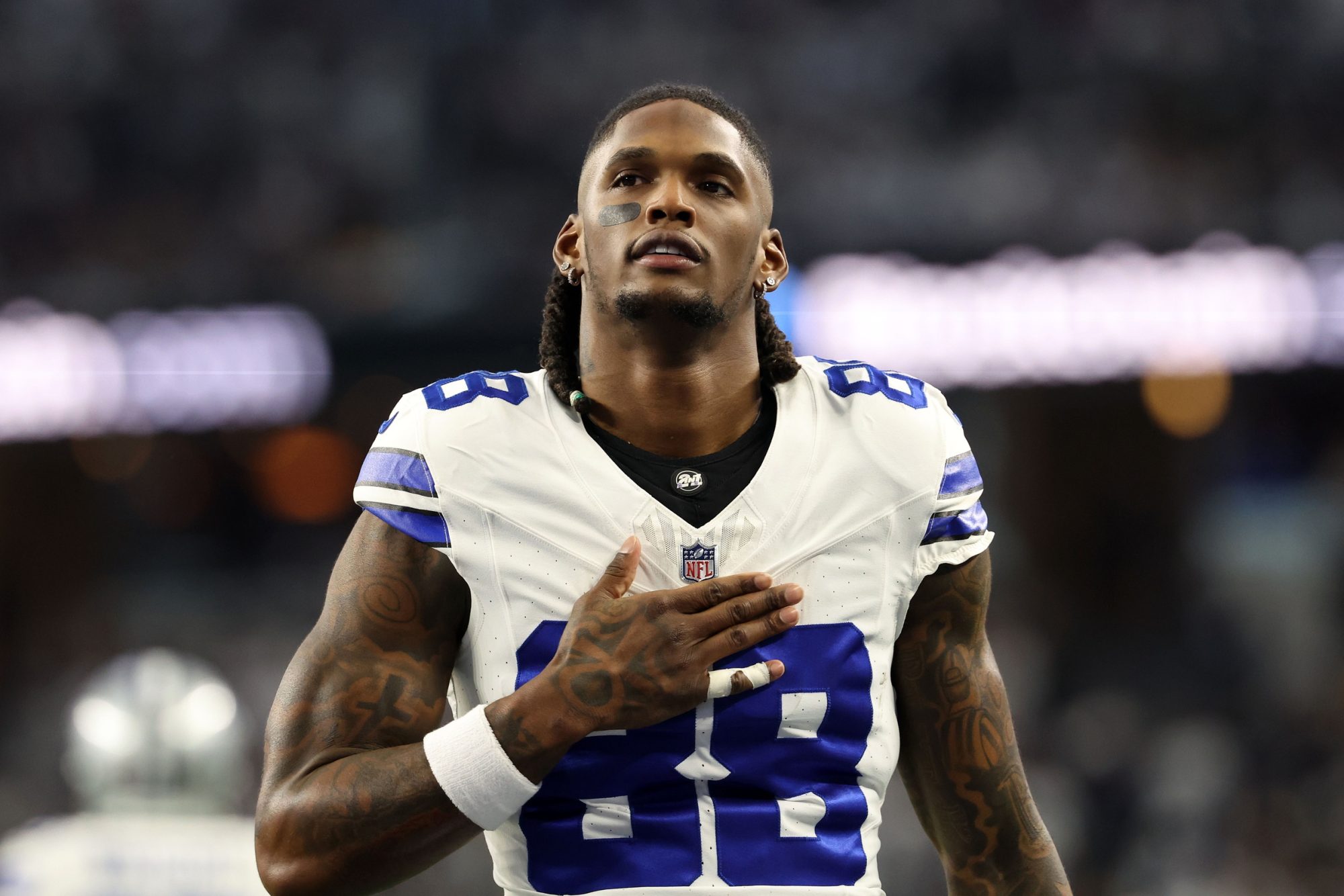 CeeDee Lamb is now the second highest paid NFL wide receiver at $34 million in AAV. Jan 14, 2024; Arlington, Texas, USA; Dallas Cowboys wide receiver CeeDee Lamb (88) before the 2024 NFC wild card game against the Green Bay Packers at AT&T Stadium. Mandatory Credit: Kevin Jairaj-USA TODAY Sports