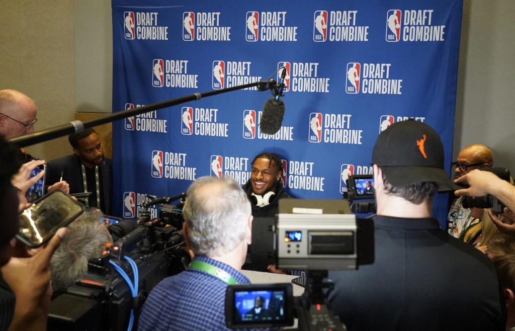 May 14, 2024; Chicago, IL, USA; Bronny James talks to the media during the 2024 NBA Draft Combine at Wintrust Arena.