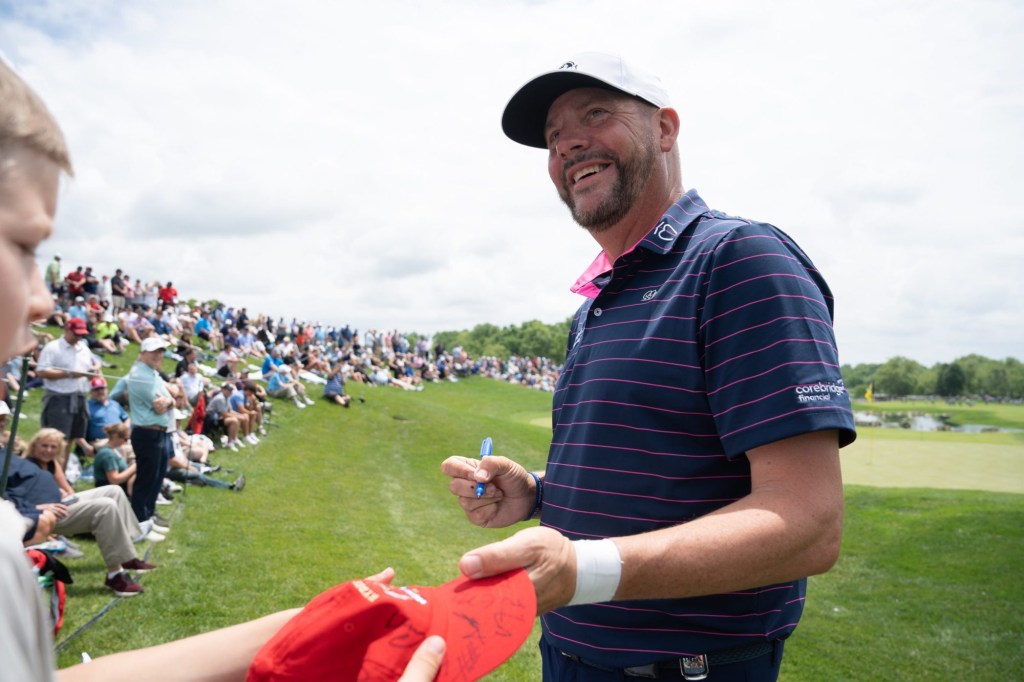 Michael Block signs autographs on the 18th hole during day three of practice for the PGA Championship at Valhalla Golf Club on Wednesday, May 15, 2024.
