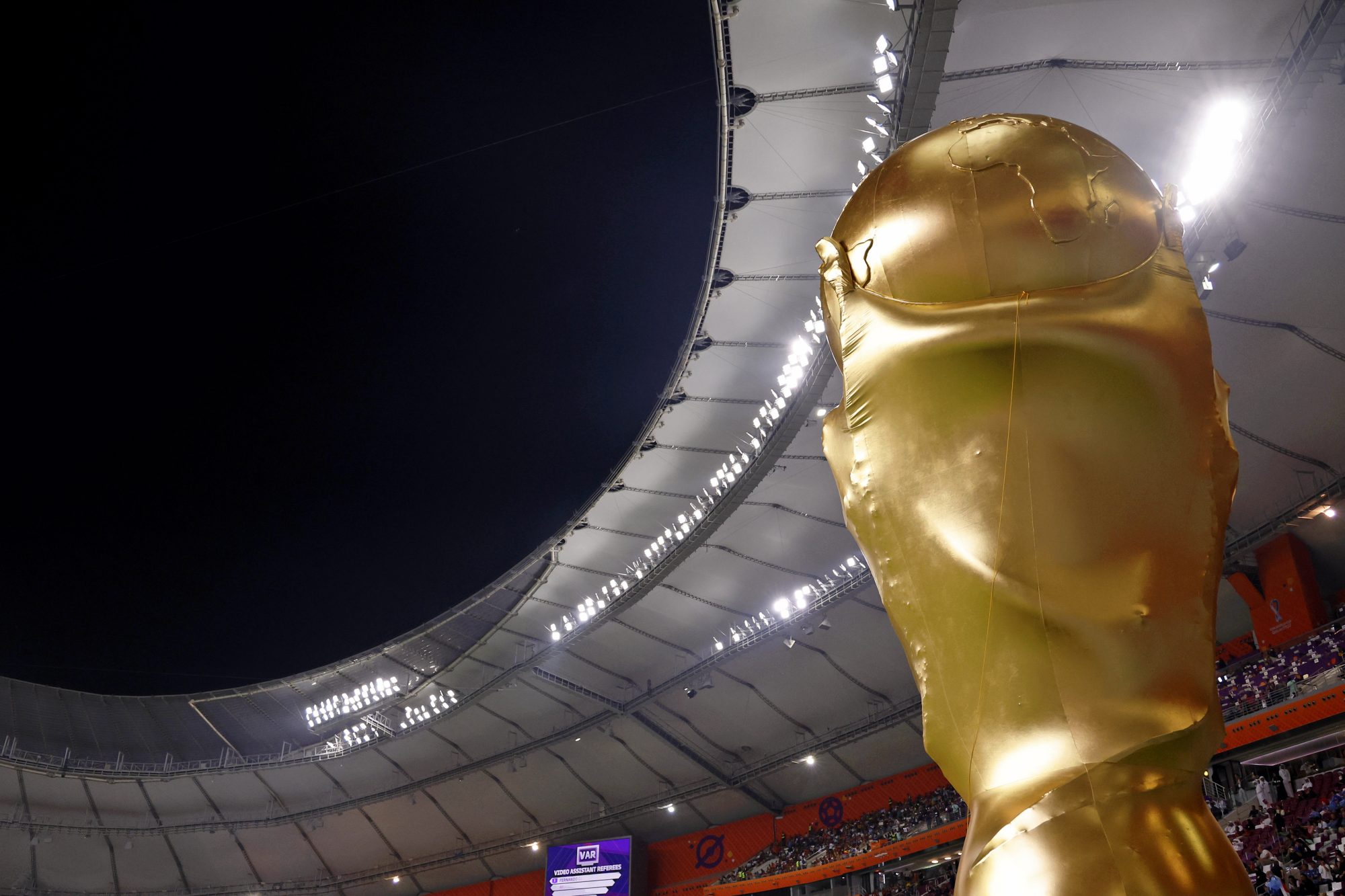 Dec 1, 2022; Doha, Qatar; A general view of a replica World Cup trophy before a group stage match between Spain and Japan during the 2022 World Cup at Khalifa International Stadium.